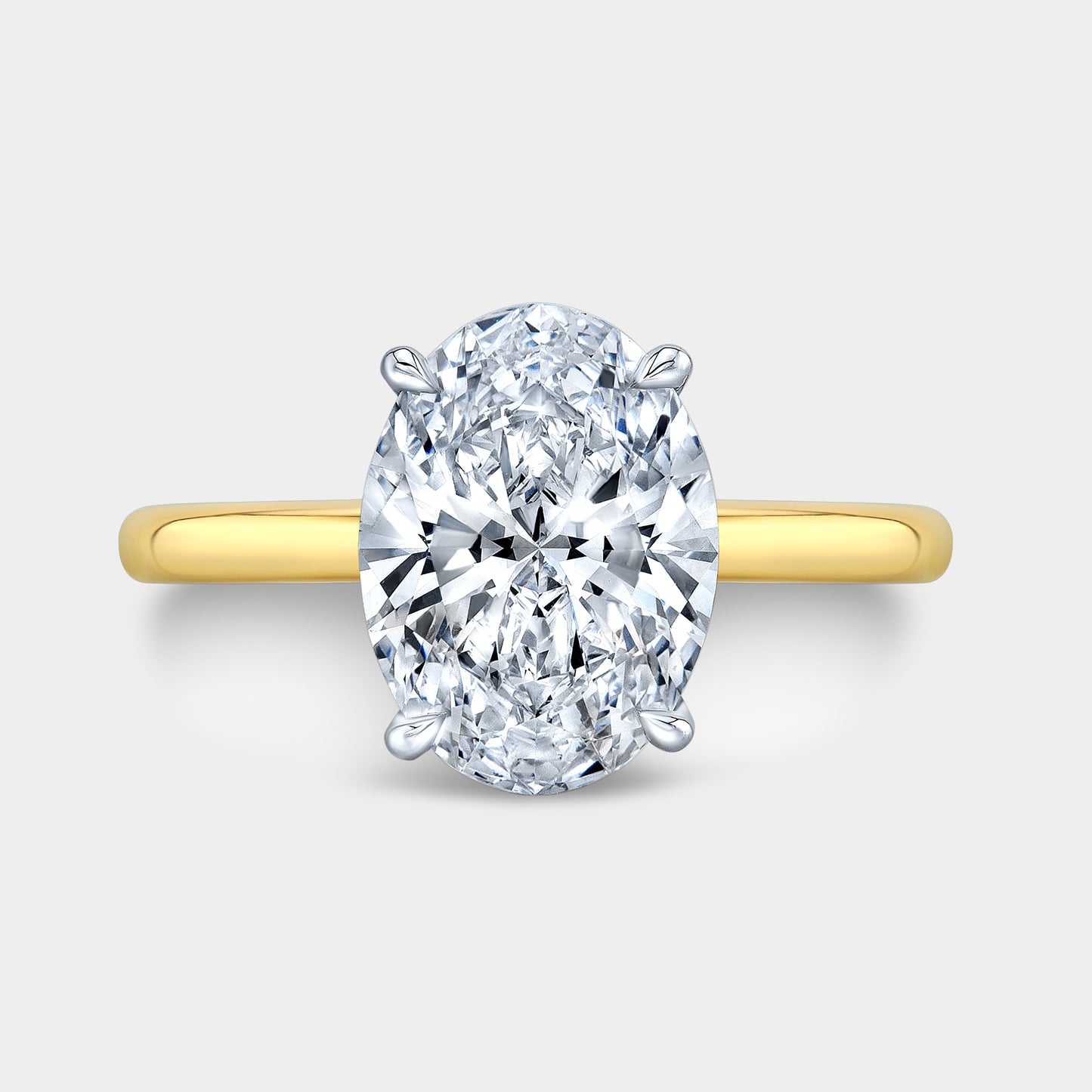 Two tone oval ring, top view, tulip solitaire.