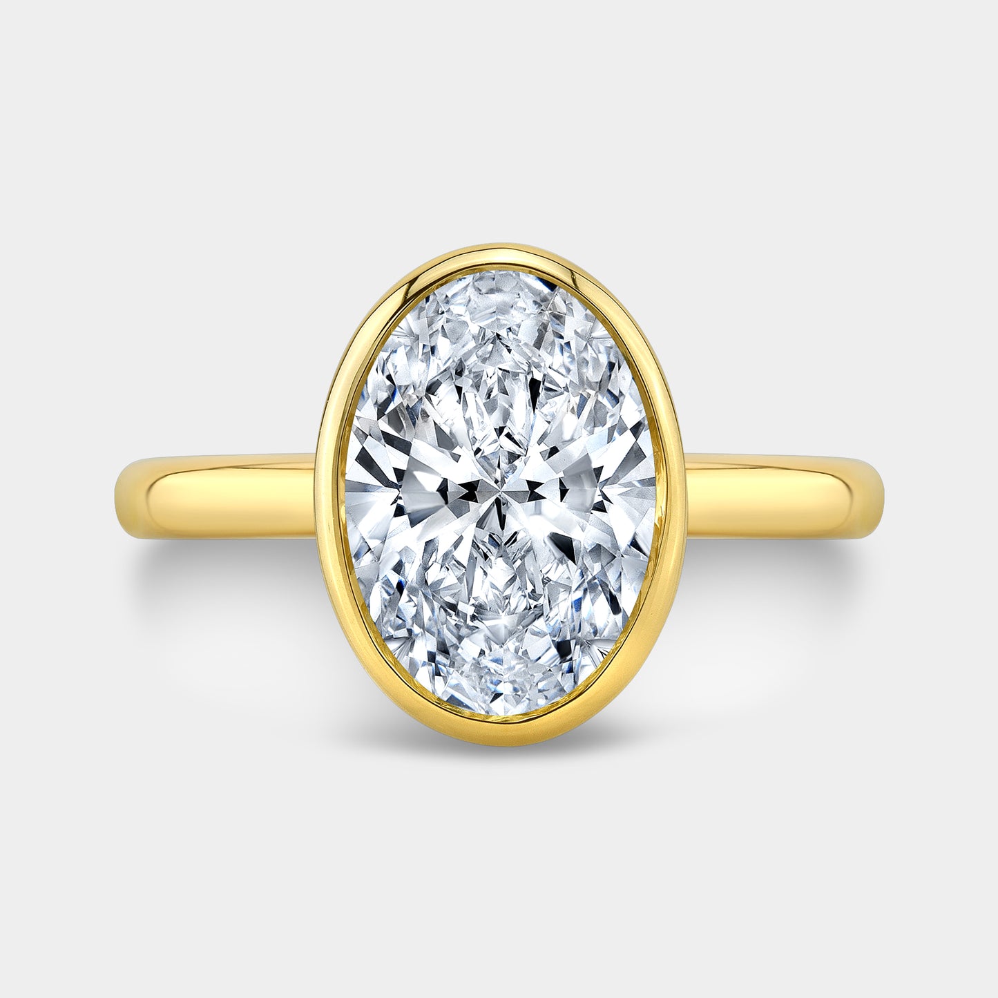 Oval ring, top down, bezel tulip solitaire.