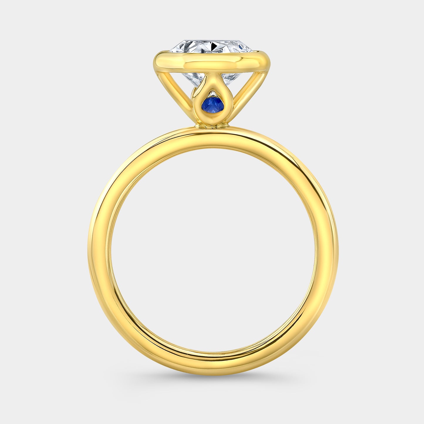 Oval solitaire ring, yellow gold, bezel tulip.