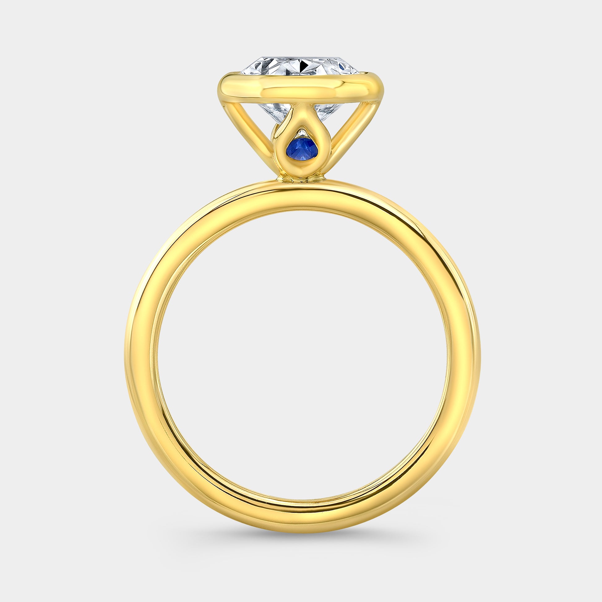 Oval solitaire ring, yellow gold, bezel tulip.