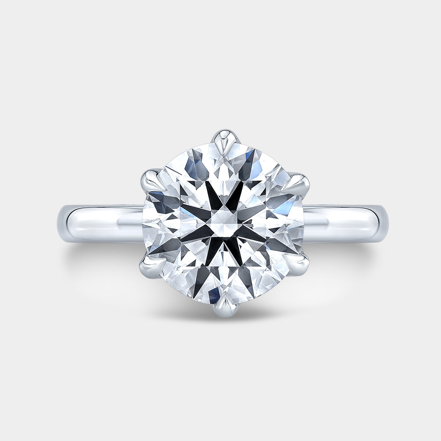Platinum round ring, top view, tulip solitaire.