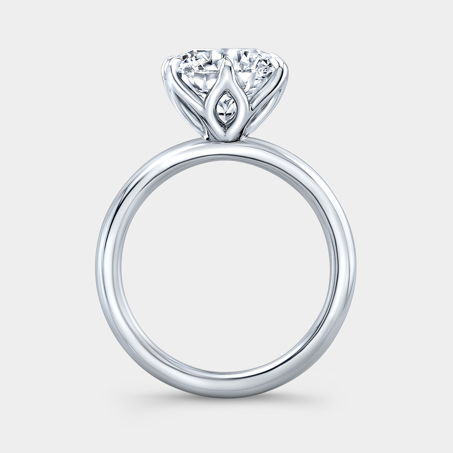 Round solitaire ring, platinum, tulip setting.