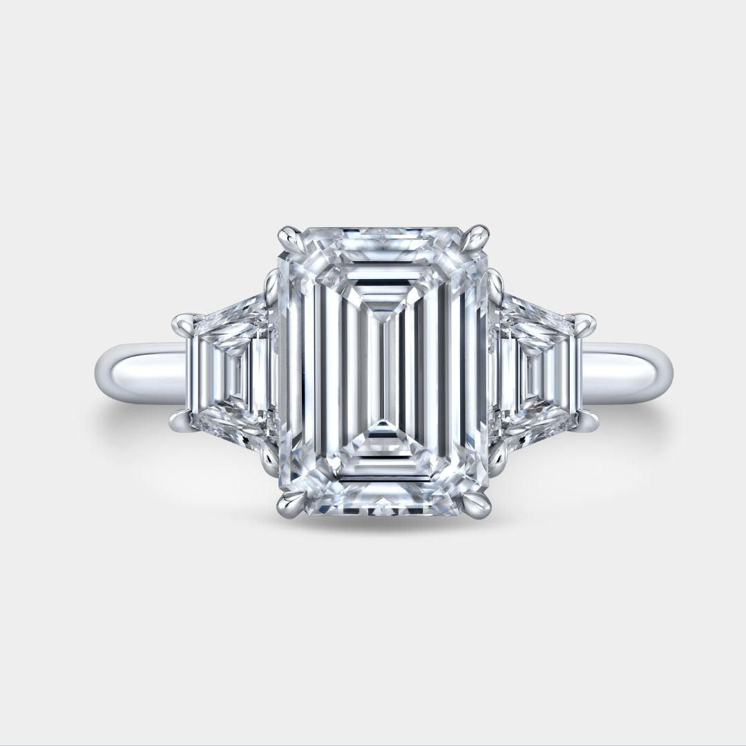 Emerald Diamond Trapezoid Cathedral Three Stone Platinum Engagement Ring