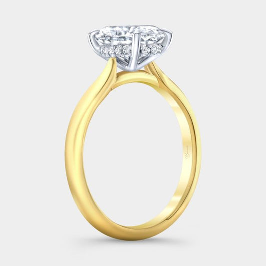 Yellow gold ring with oval diamond, front view.