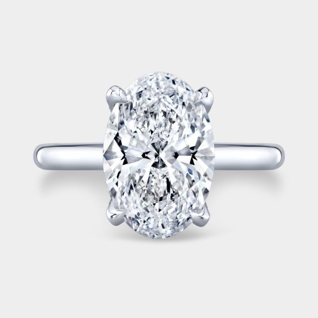 Oval diamond ring, tulip setting.