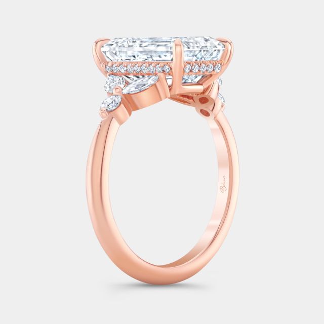 Emerald diamond ring, gold detail.