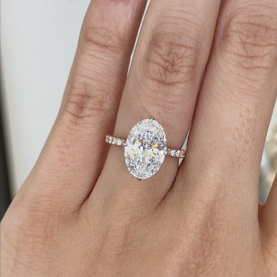 Oval ring video, worn on hand, tulip pave setting.