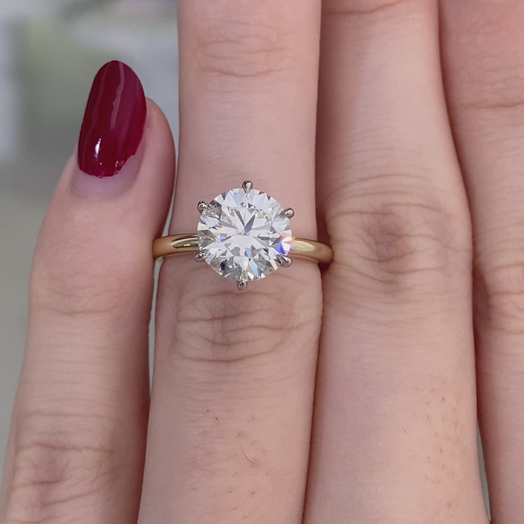 Round ring video, worn on hand, solitaire setting.