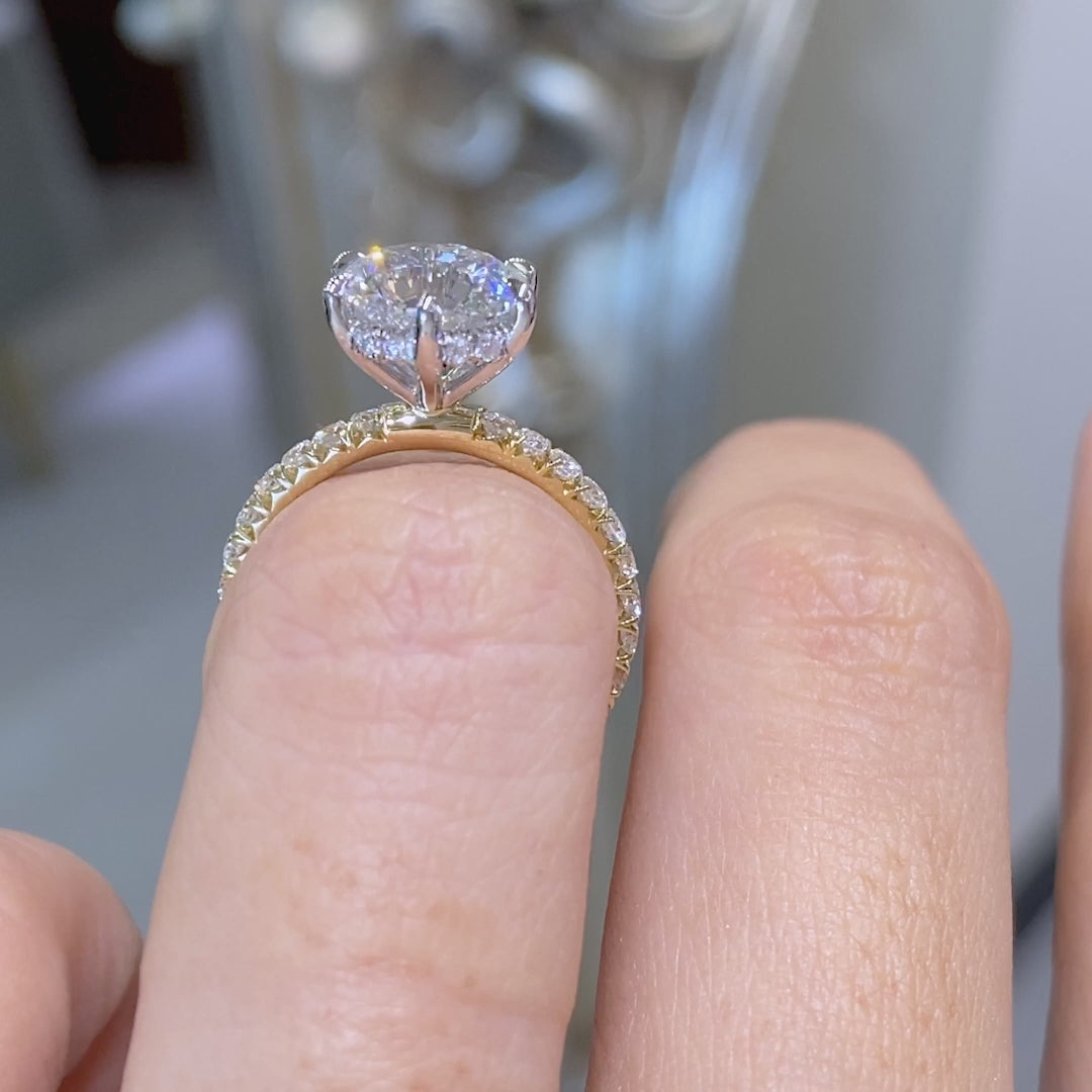Round ring video, worn on hand, pave band.