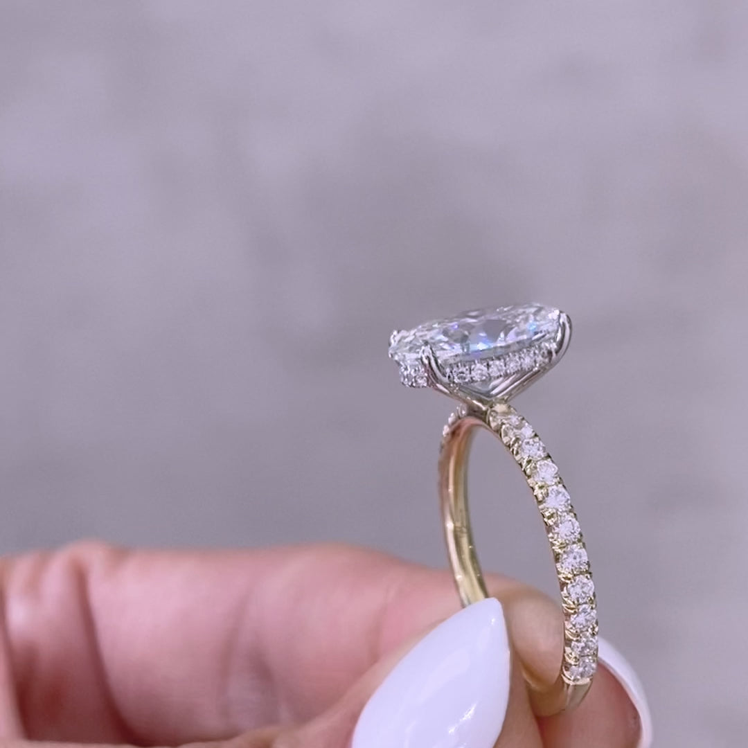 Oval ring video, worn on hand, U pave band.