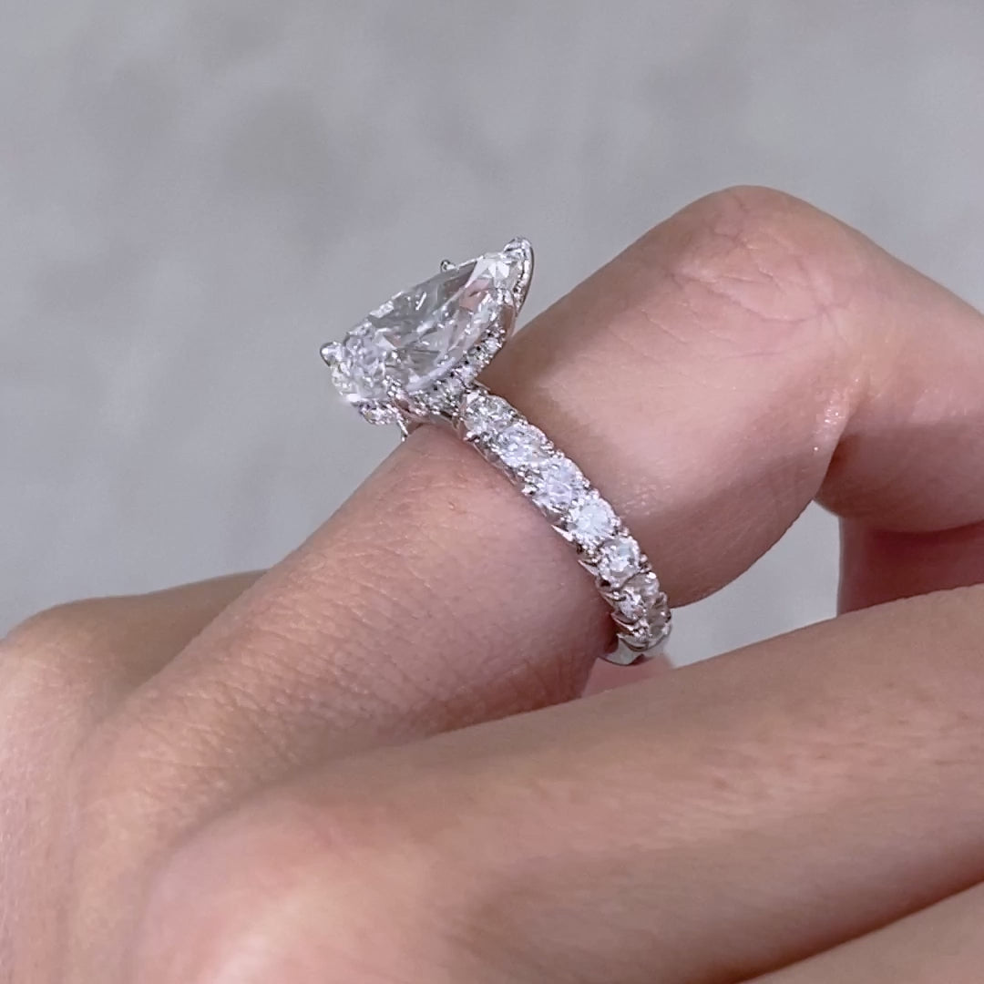 Diamond ring on hand, size view.