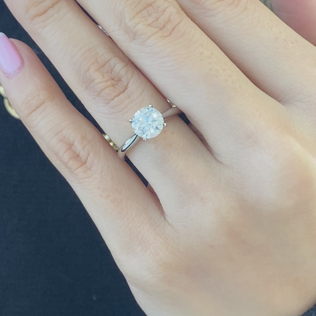 Round ring video, worn on hand, solitaire setting.