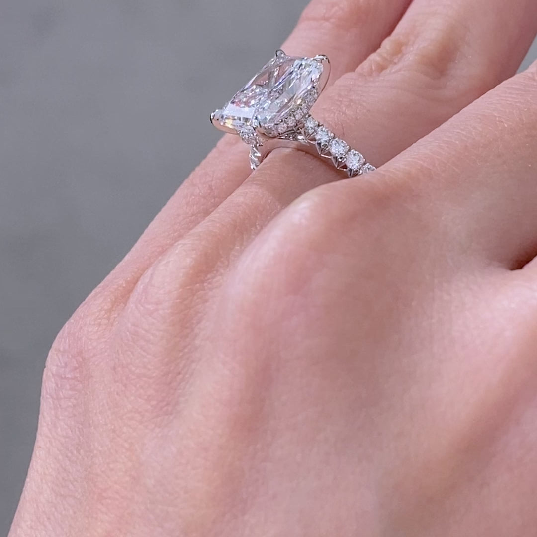 Diamond ring on hand, size view.