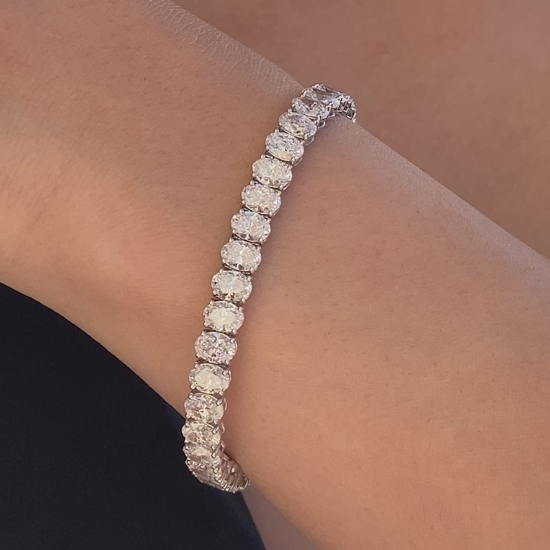 Video of a 16ct oval diamond white gold tennis bracelet.