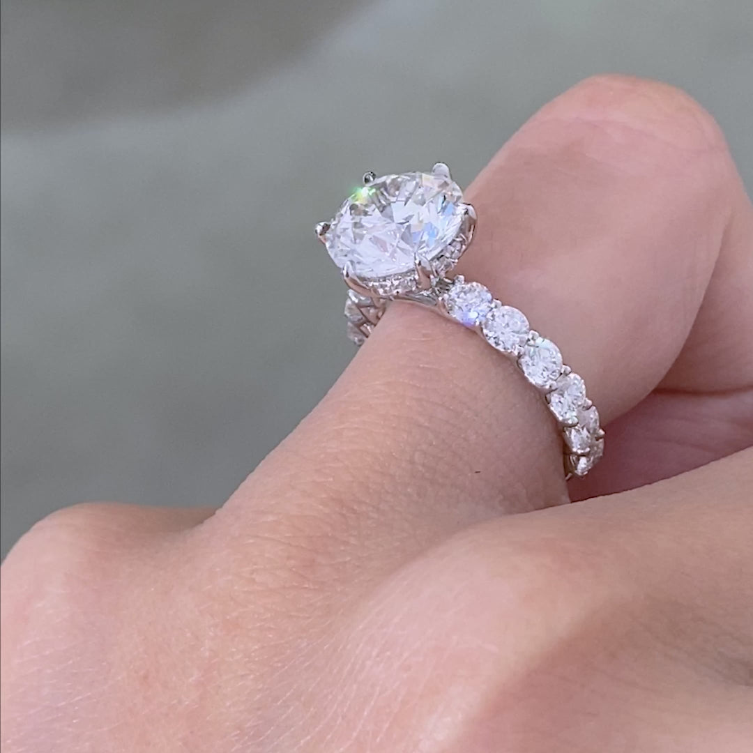 Eloise engagement ring being worn on finger.