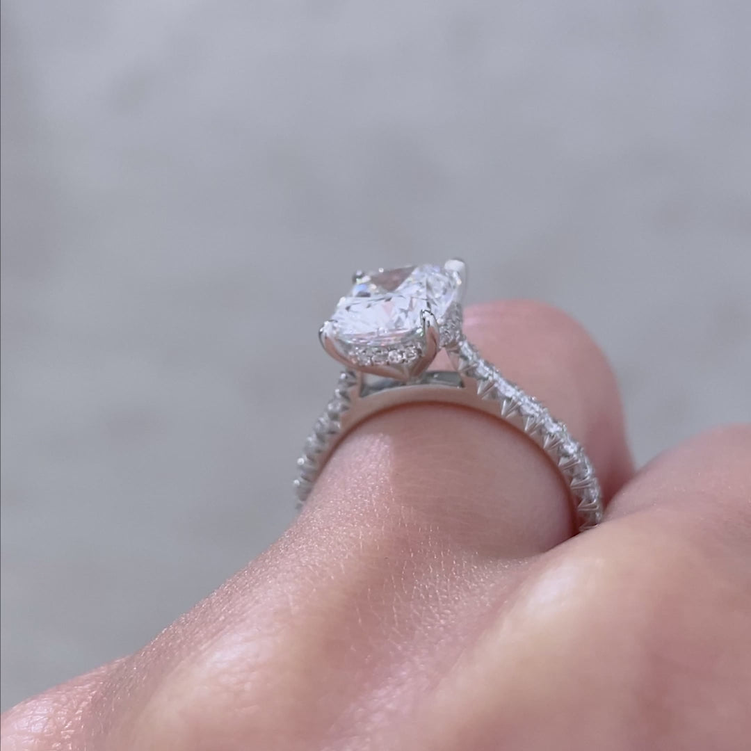 Diamond ring on hand, size view.
