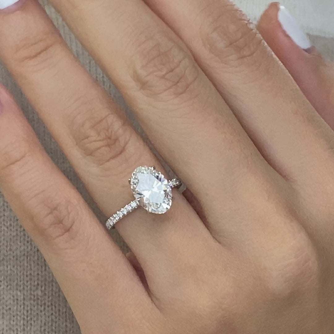 Video of a 2ct oval diamond engagement ring with U pave band.