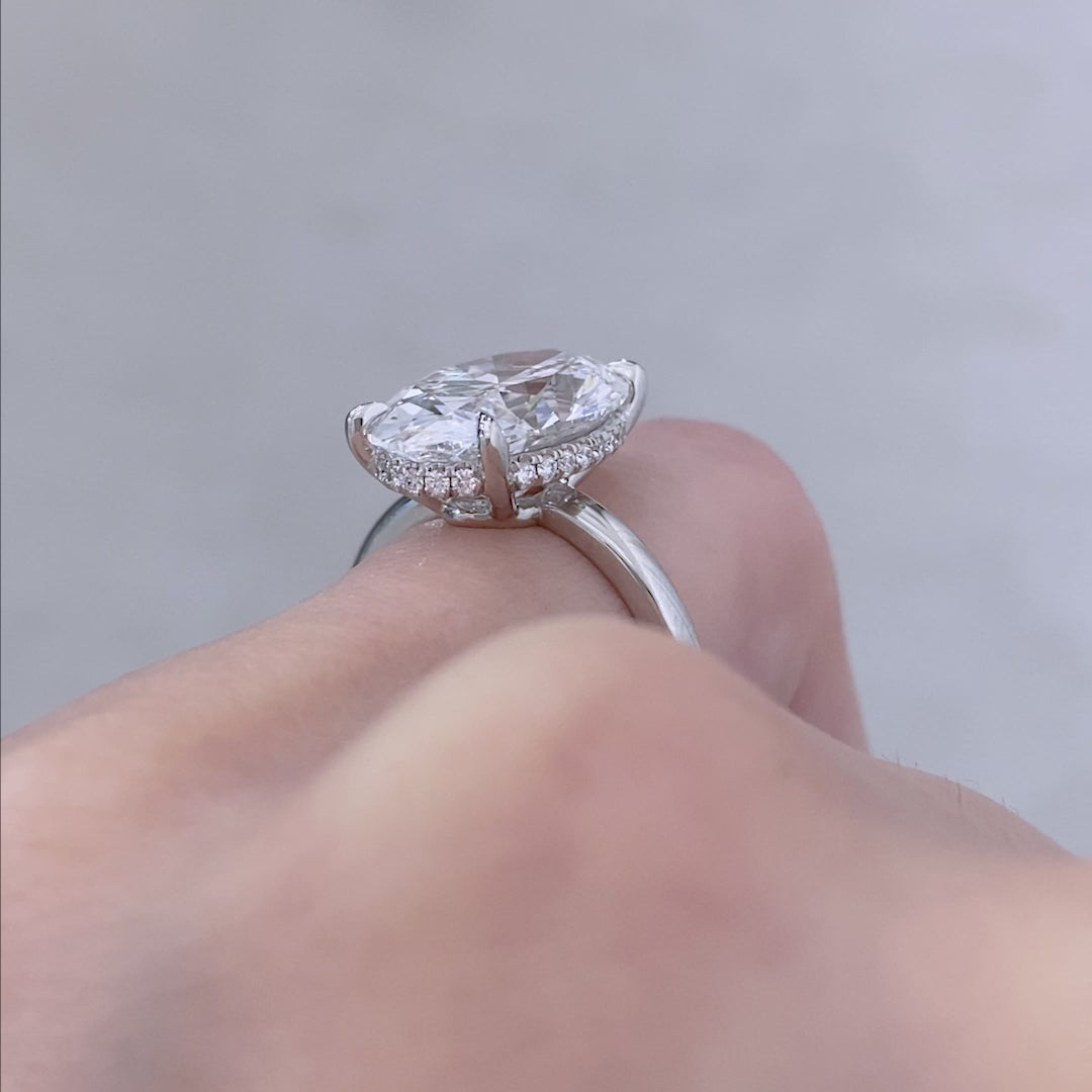 Video of a 5.5ct oval diamond Hailey engagement ring with hidden halo.