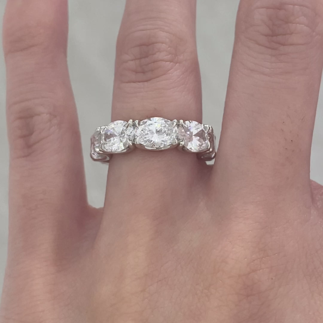 Platinum band video, oval diamonds, U gallery details, and eternity band design.
