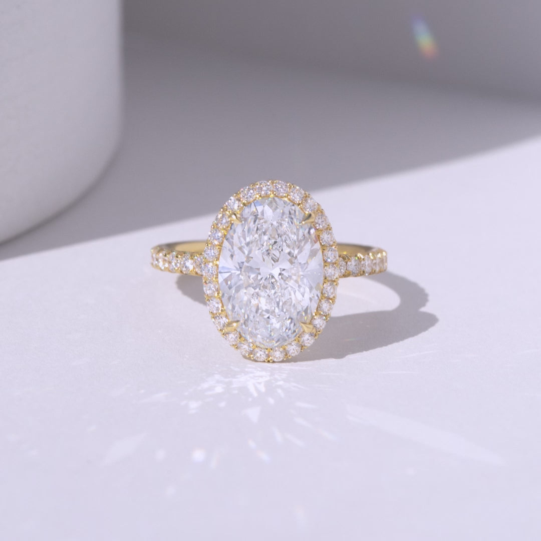 Oval ring video, worn on hand, U pave band.