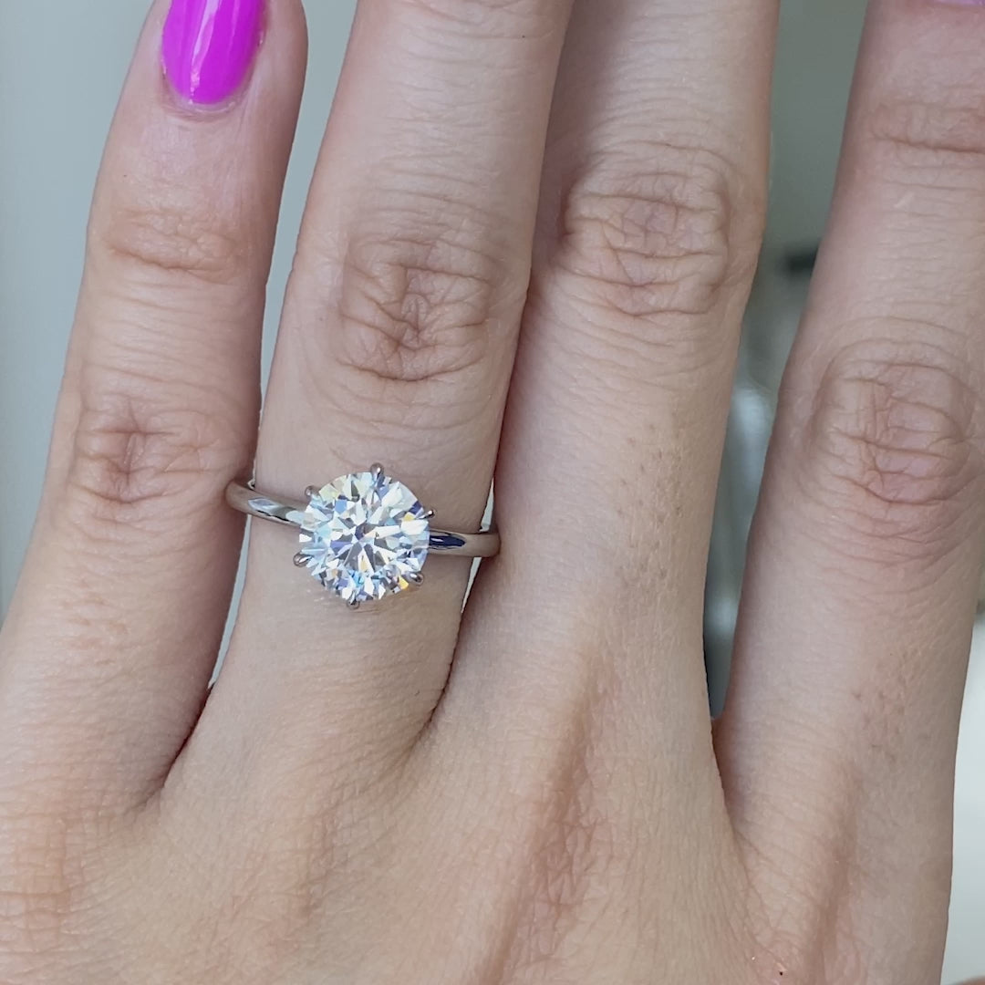 Round ring video, worn on hand, solitaire setting.