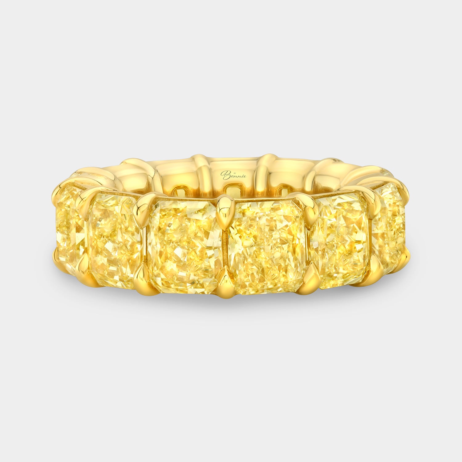 Yellow diamond eternity band, radiant cut.
