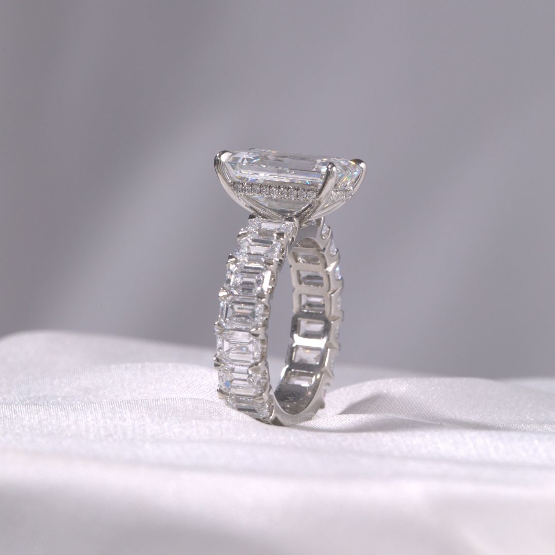 5.13ct Lab Emerald Cut Diamond with Emerald Side Diamonds Platinum Engagement Ring