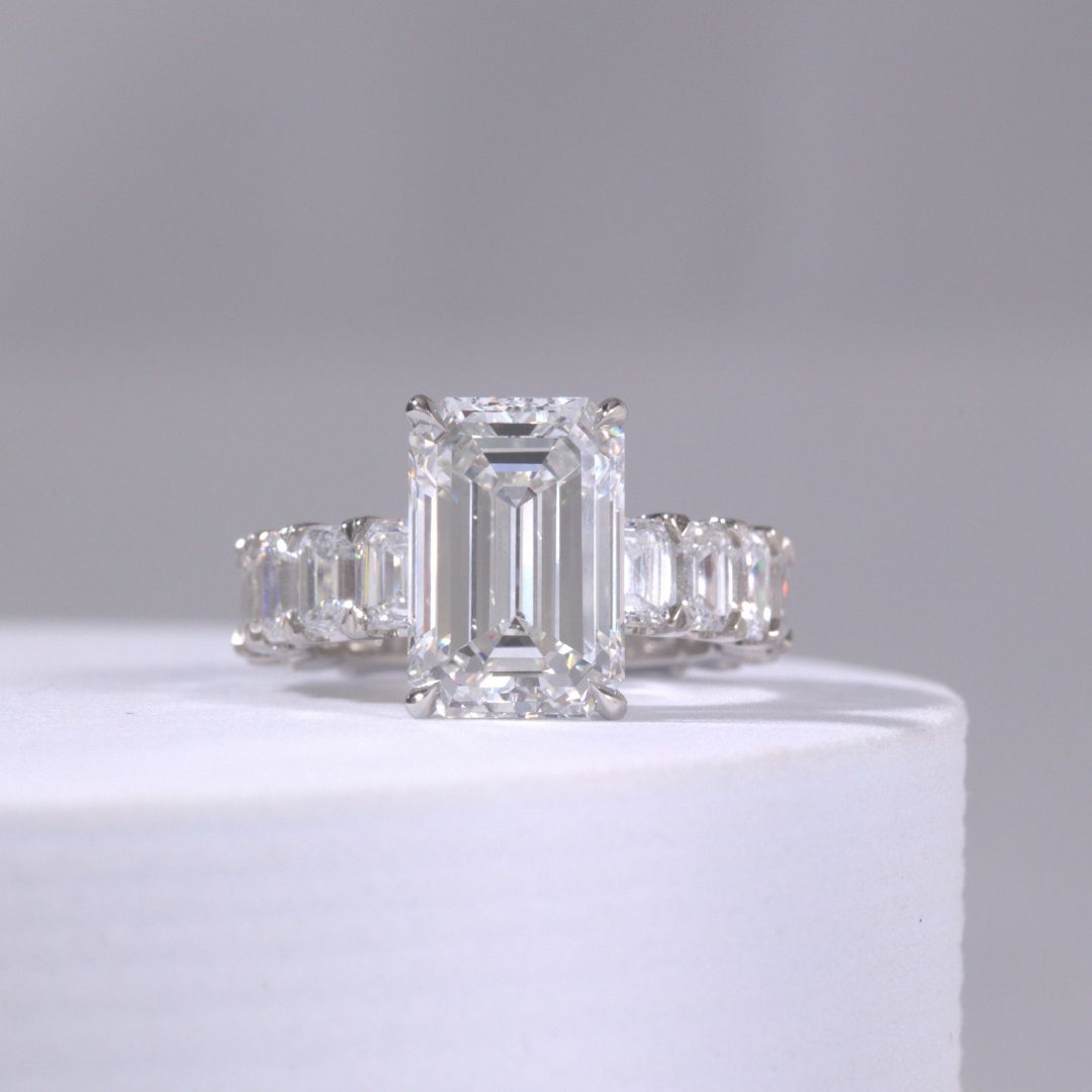 5.13ct Lab Emerald Cut Diamond with Emerald Side Diamonds Platinum Engagement Ring