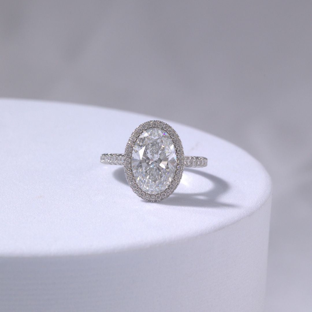 Oval Diamond Seamless Double Halo Tapered Cathedral French Pavee Platinum Engagement Ring