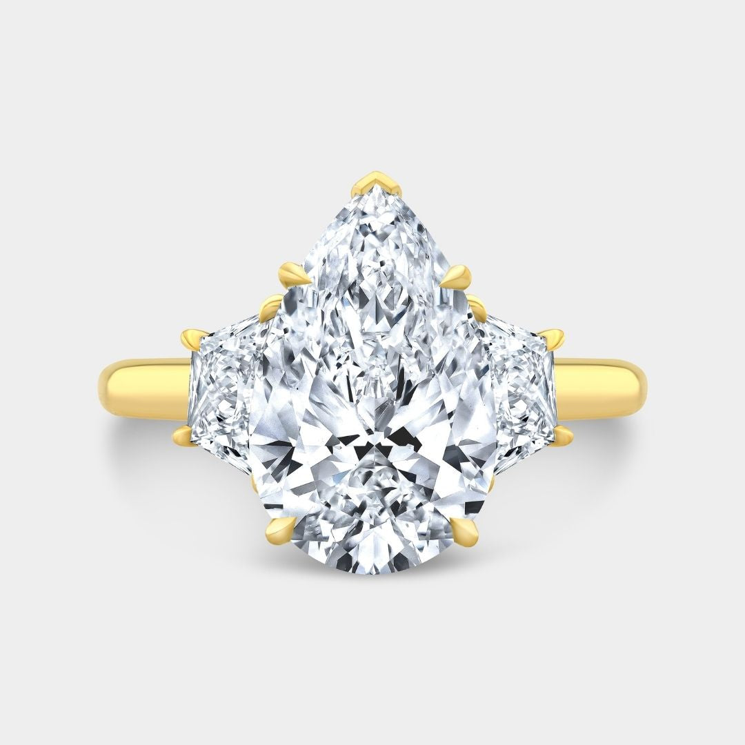 4ct Pear Shape Diamond with Trapezoid Yellow Gold 3 Stone Ring