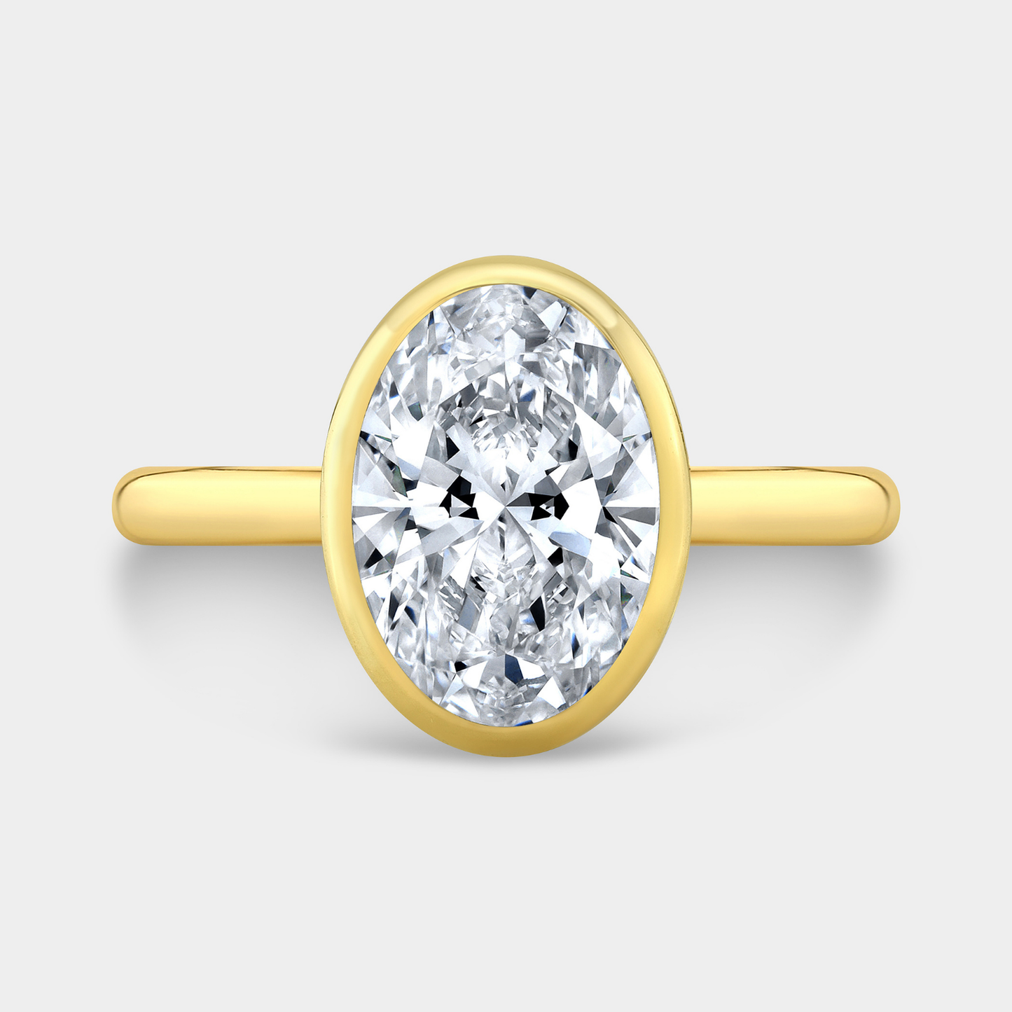 Oval Diamond Hidden Halo Bezel Set Solitaire Yellow Gold Engagement Ring