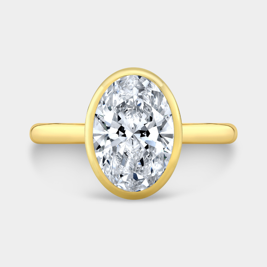 Oval Diamond Hidden Halo Bezel Set Solitaire Yellow Gold Engagement Ring