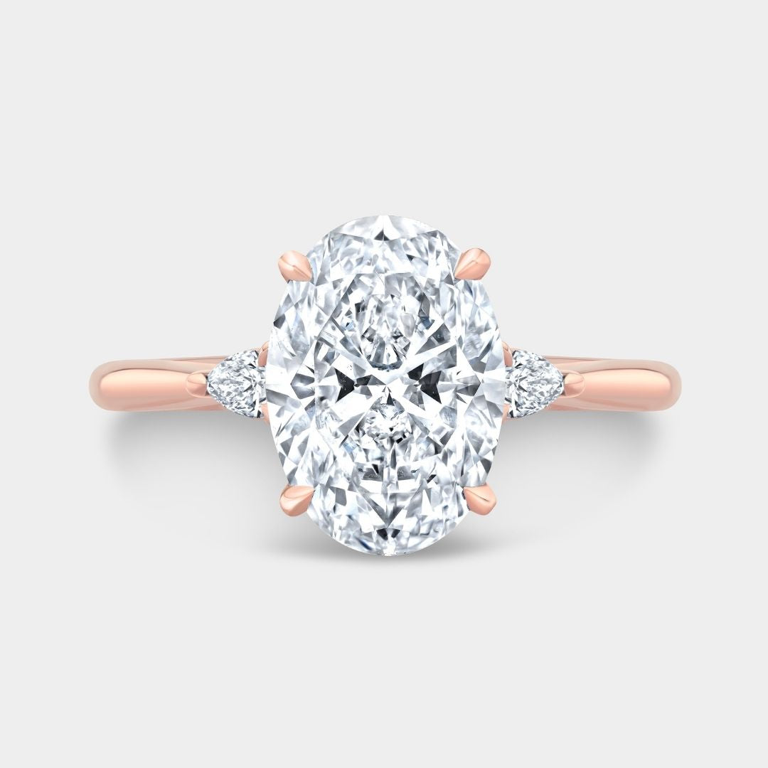 Oval Diamond 3 Stone Pear Shape Side Stones Rose Gold Engagement Ring