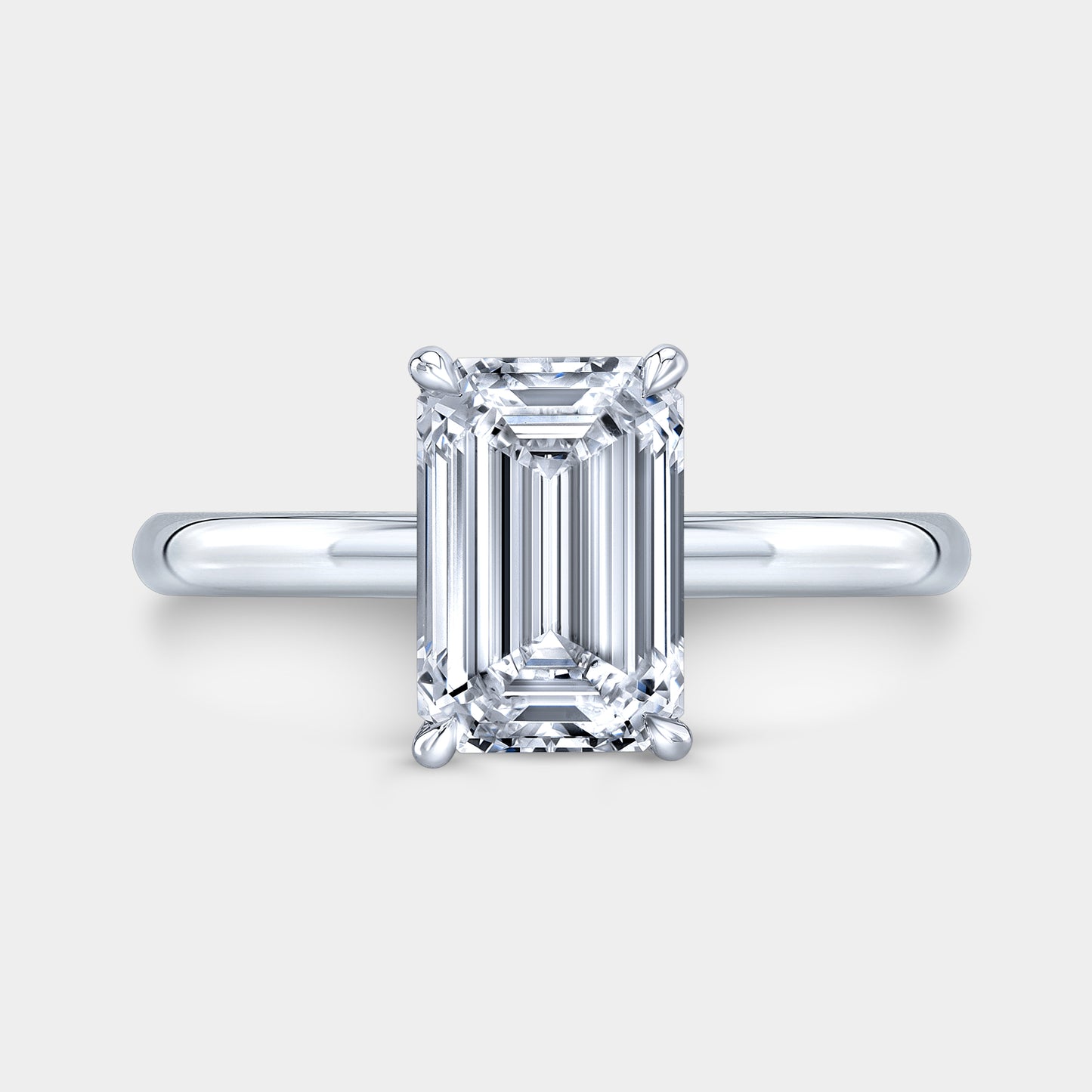 Emerald Diamond Solitaire Platinum Engagement Ring