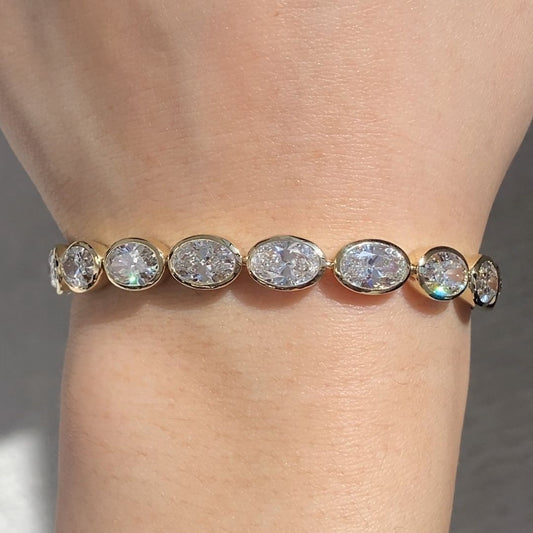 15ct Lab Grown Oval Diamond East West Bezel Yellow Gold Tennis Bracelet