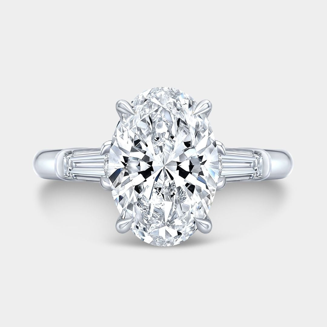 Oval Diamond 3 Stone Ring with Tapered Baguette Side Stones Platinum Engagement Ring