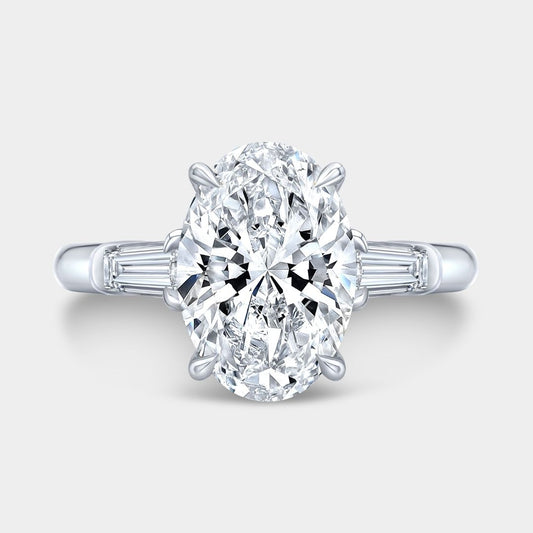 Oval Diamond 3 Stone Ring with Tapered Baguette Side Stones Platinum Engagement Ring