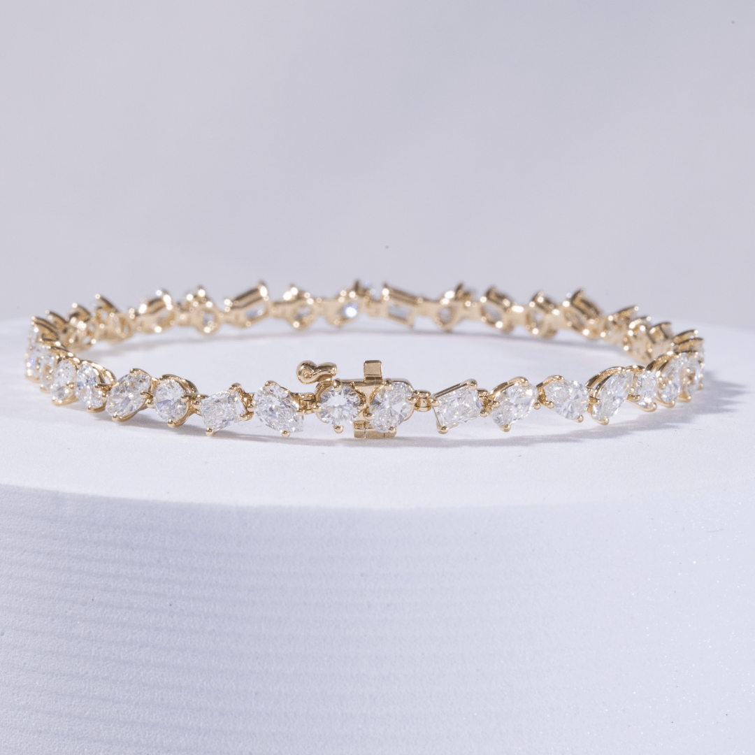 7ct Lab Grown Multi Shape Diamond Tennis Bracelet in Yellow Gold