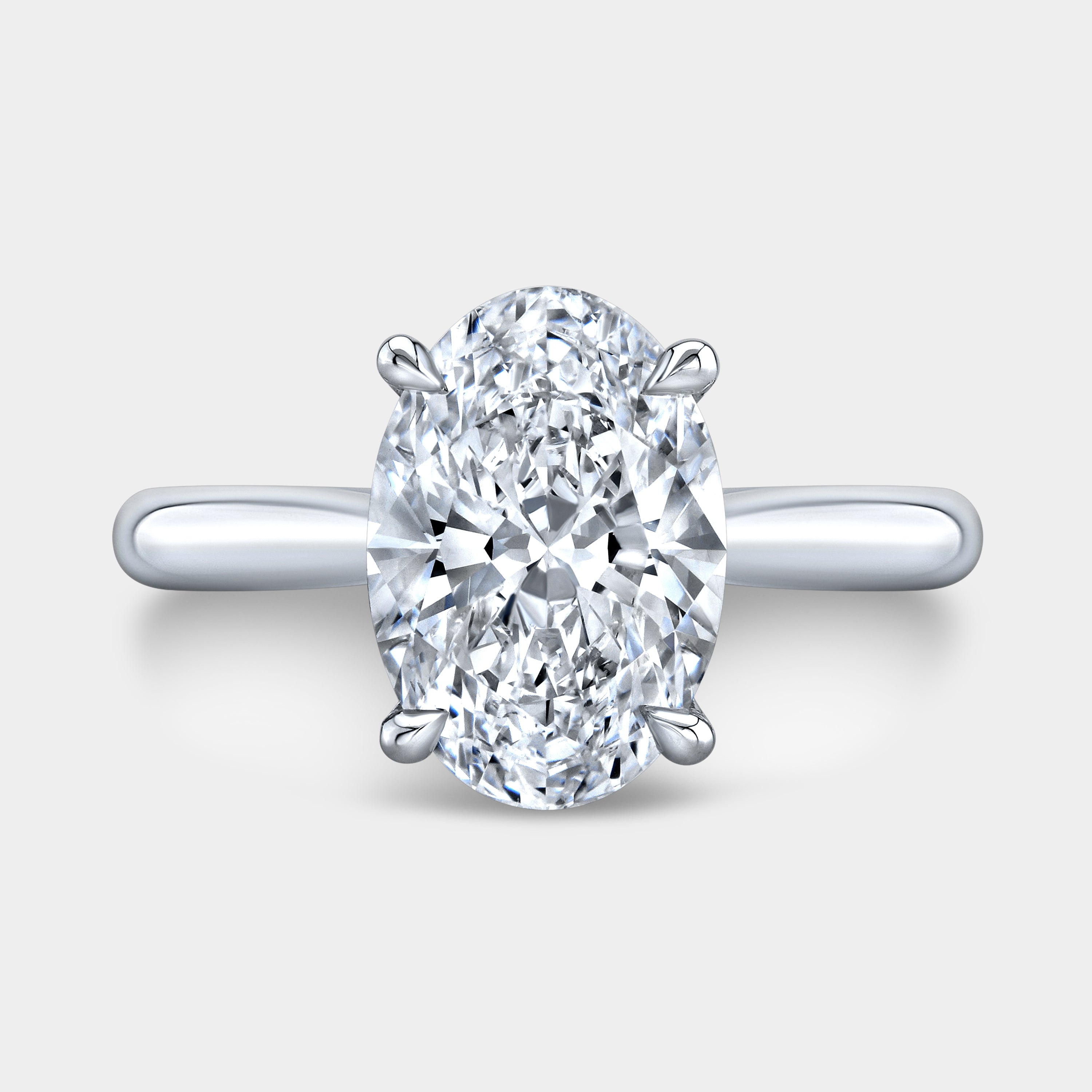Oval Diamond Tapered Cathedral Solitaire White Gold Engagement