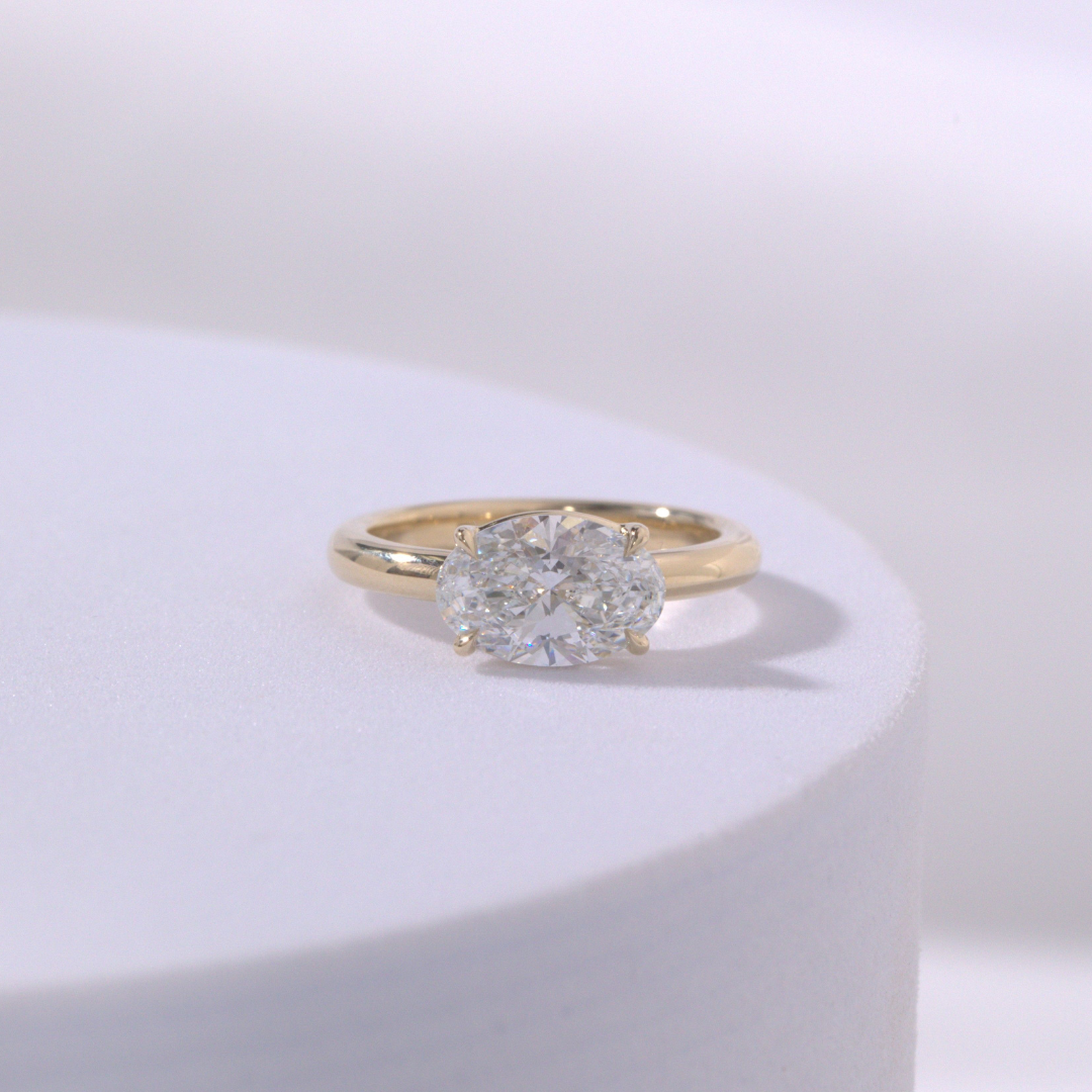 Oval Diamond East West Low Profile Solitaire Yellow Gold Pinky Ring