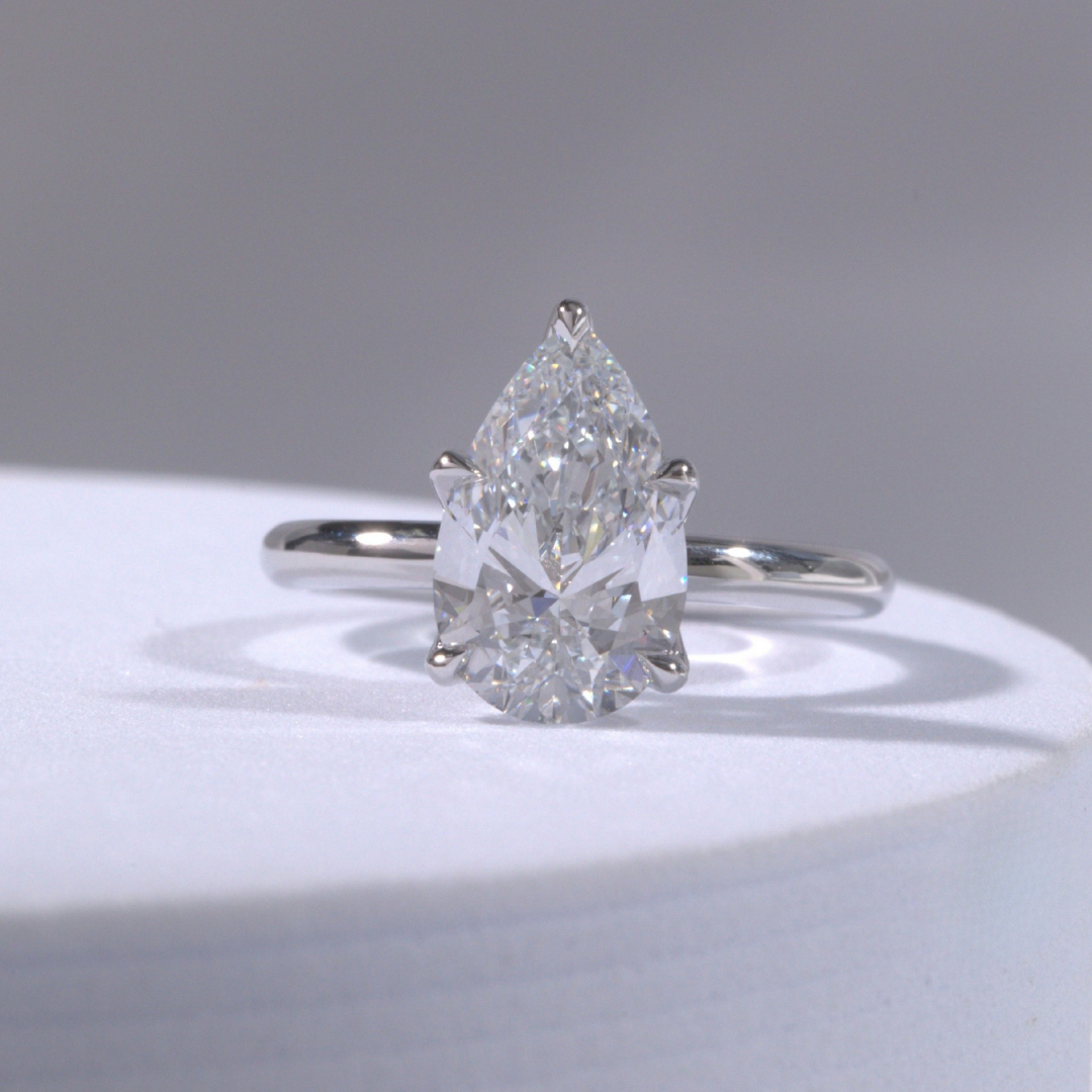 Pear Diamond Tulip Solitaire Platinum Engagement Ring