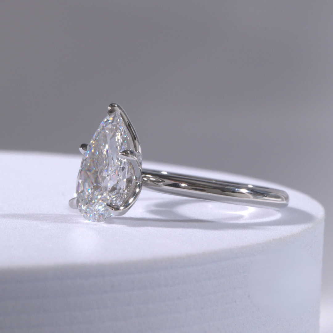 Pear Diamond Tulip Solitaire Platinum Engagement Ring
