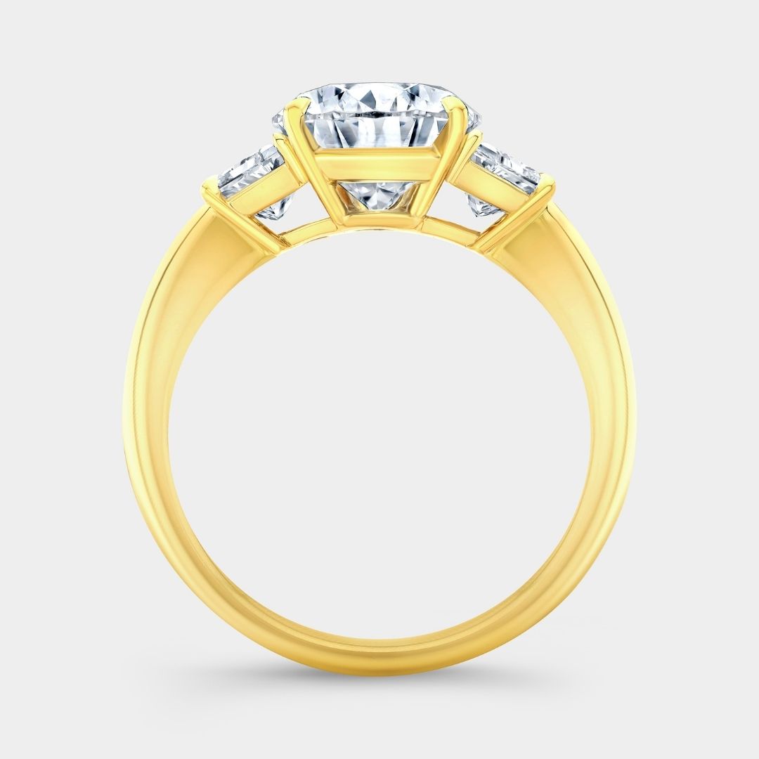 4ct Pear Shape Diamond with Trapezoid Yellow Gold 3 Stone Ring