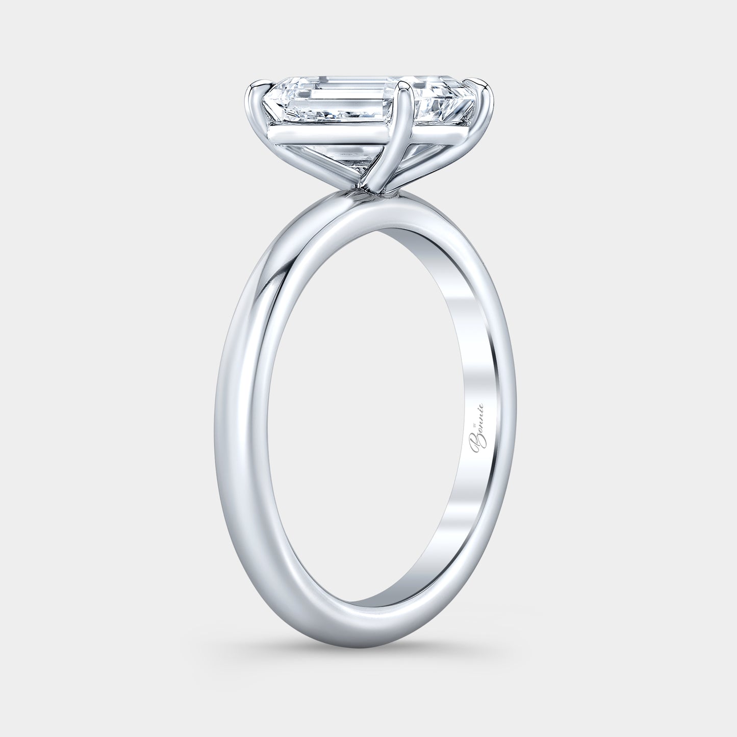 Emerald Diamond Solitaire Platinum Engagement Ring