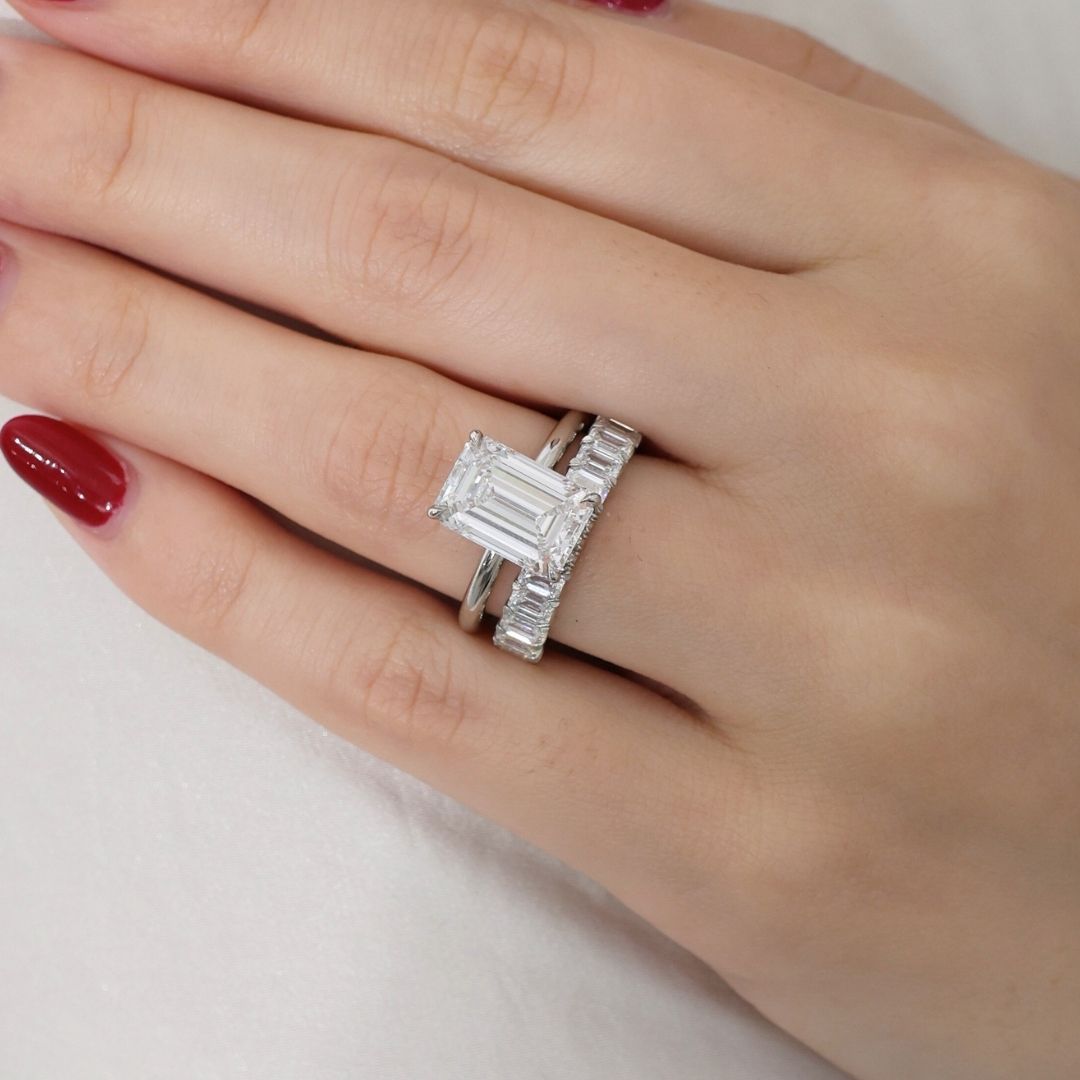  4.25ct emerald cut diamond platinum solitaire engagement ring with hidden halo