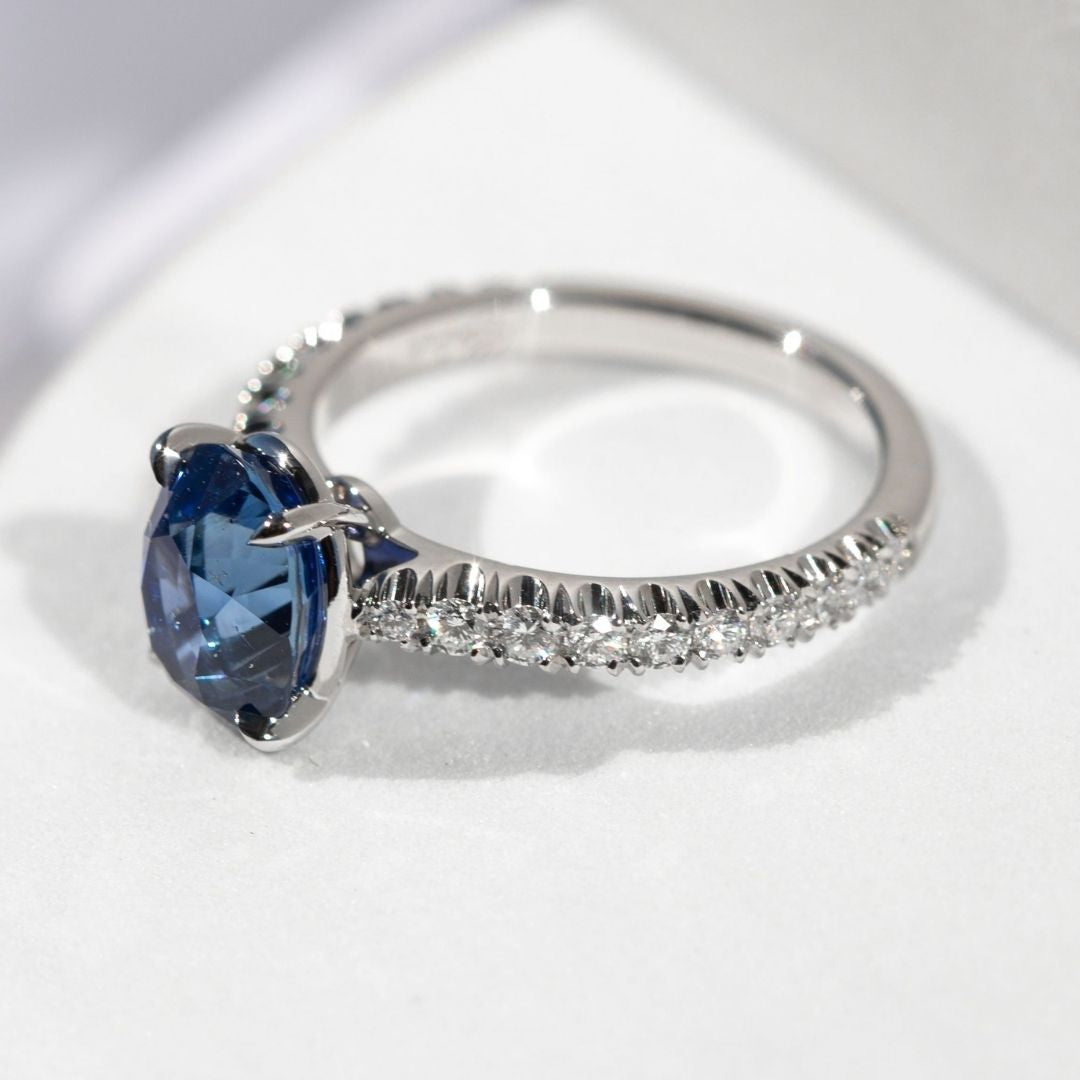 Oval Blue Sapphire Gemstone with U Pave Tapered Cathedral Platinum Engagement Ring