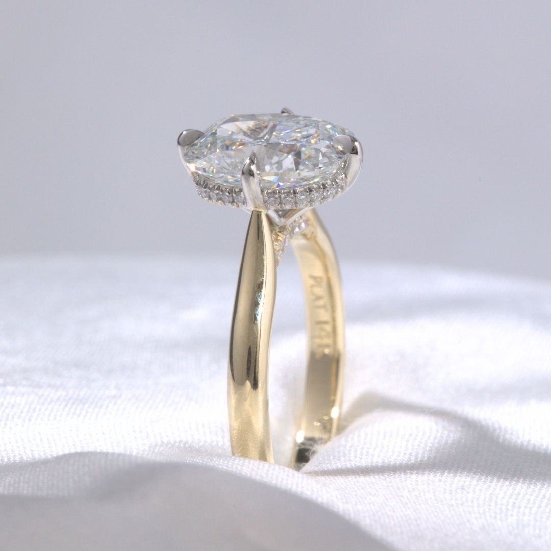 Cushion Diamond North South Prong Hidden Halo Tapered Cathedral Solitaire with Pave Diamond Bridge Yellow Gold And Platinum Engagement Ring