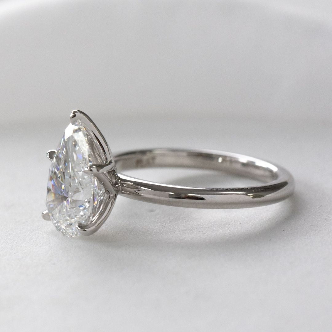 Pear Shape Diamond Tulip Basket Solitaire Platinum Engagement Ring