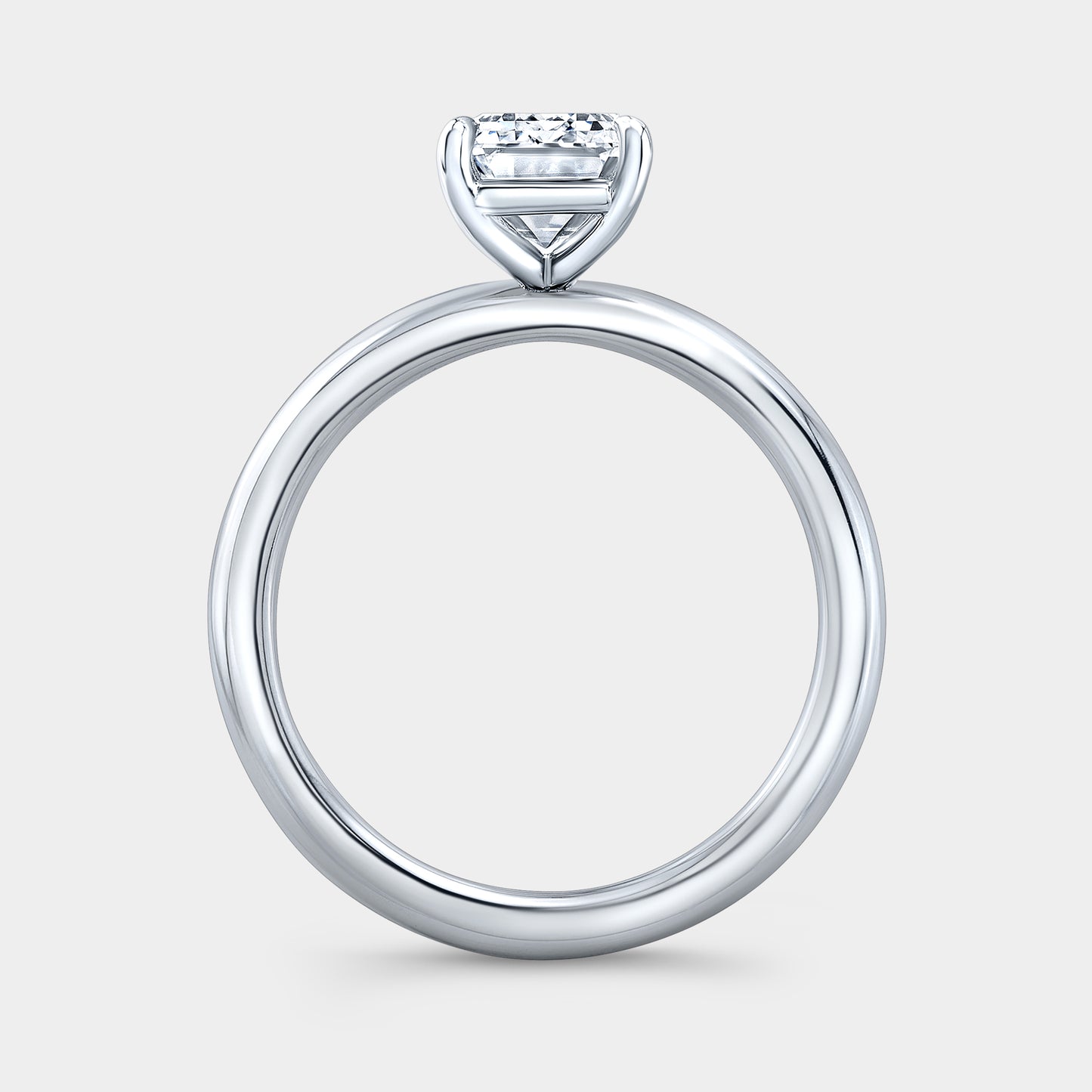 Emerald Diamond Solitaire Platinum Engagement Ring