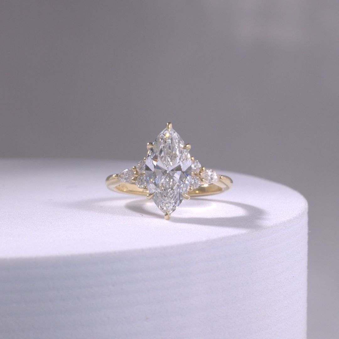 Marquise Diamond Claudia 7 Stone Cluster Hidden Halo Yellow Gold Engagement Ring